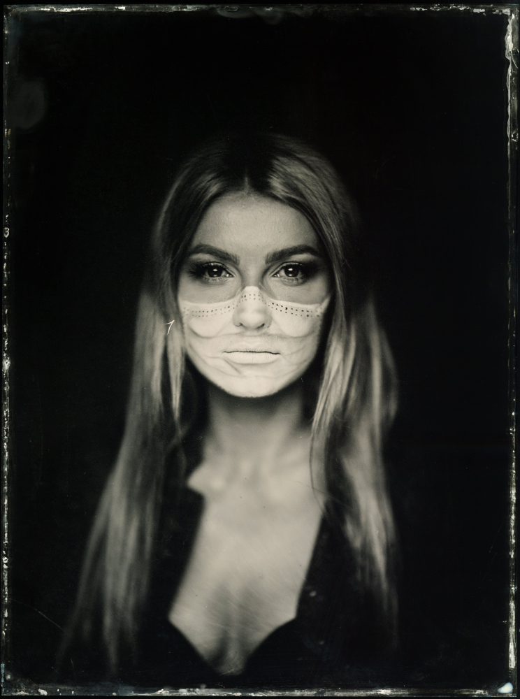 A woman in a mask
